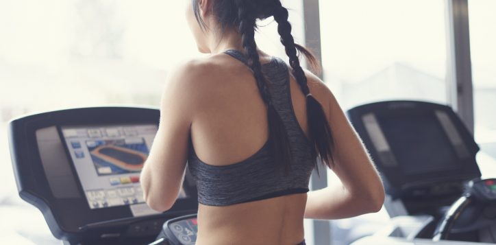 confident-woman-running-on-treadmill